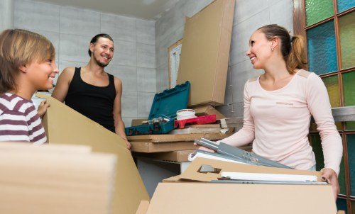 Man and van removals service in Stratford with a moving van and boxes