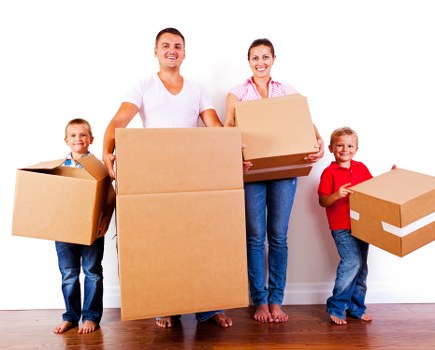 Moving team preparing items safely during a van relocation