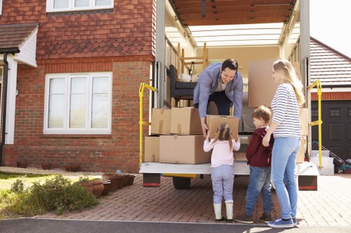 Loading furniture into a van near Stratford homes and apartments