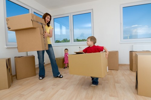Loading furniture into a moving van during a house move