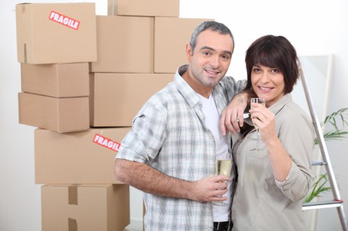 Stratford furniture pick-up team handling heavy items carefully